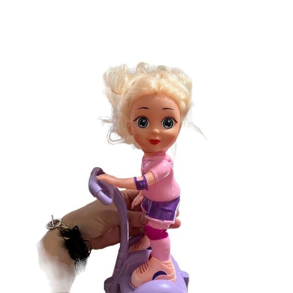 Blonde Haired Doll on Segue ! Just cruising ! Battery-powered, Still Works! Good - Picture 1 of 4